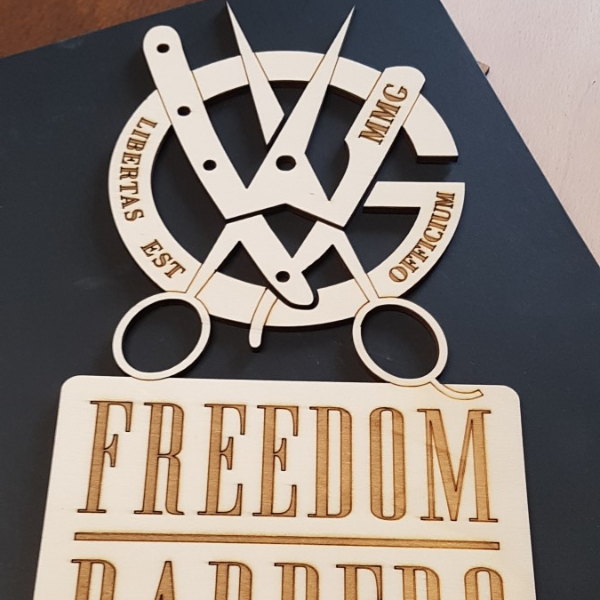 barbershop logo na stenu