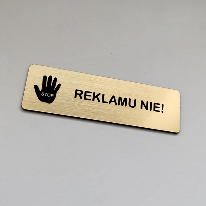 zlatá tabulka Reklamu ne se symbolem STOP
