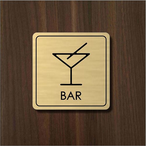 zlatý piktogram bar s koktejlovou sklenicí